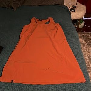 Back country burn orange dress with two side zip pockets. Tags still on.